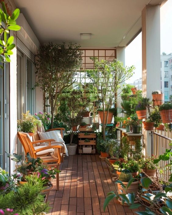a beautiful balcony with modern, stained furniture, a box stand, some foliage plants and cacti and a trellis as a room divider