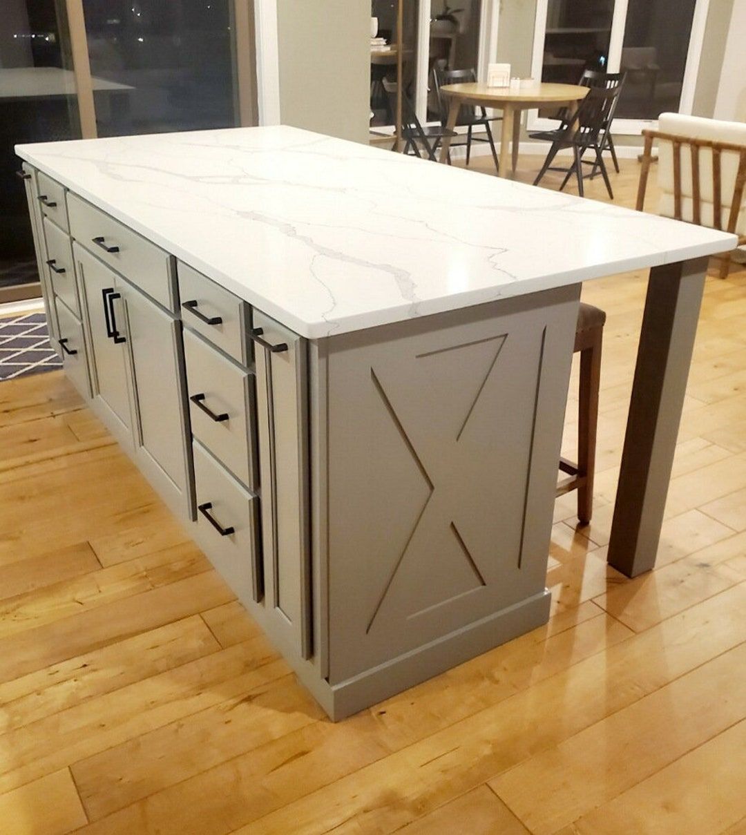 Creating the Perfect Gathering Spot: The  Beauty and Functionality of a Kitchen Island with Seating