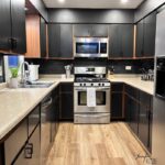 Wood and Black Kitchen Cabinets - Jennifer Riz