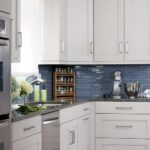 White Kitchen Cabinets with Blue Glass Tile Backsplash .