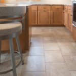 Elegant Ceramic Tile Flooring and Cream Lantern Backspla