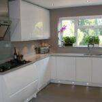 white gloss kitchen with grey worktops | White gloss kitchen .
