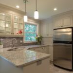 Off-White Kitchen Remodel with Improved Storage Space in Acton