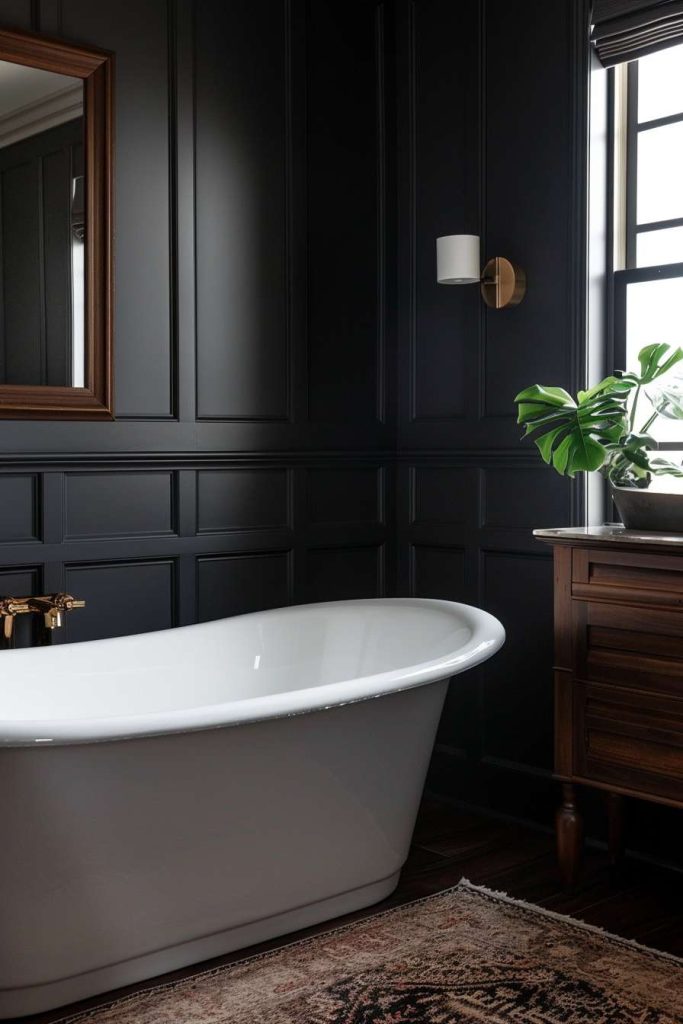 Bathroom with dark paneled walls, a freestanding <a href=