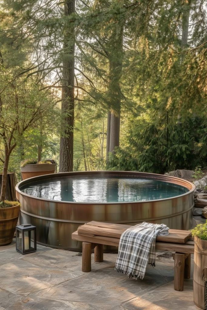 Camp pool surrounded by trees with a bench and lantern nearby.