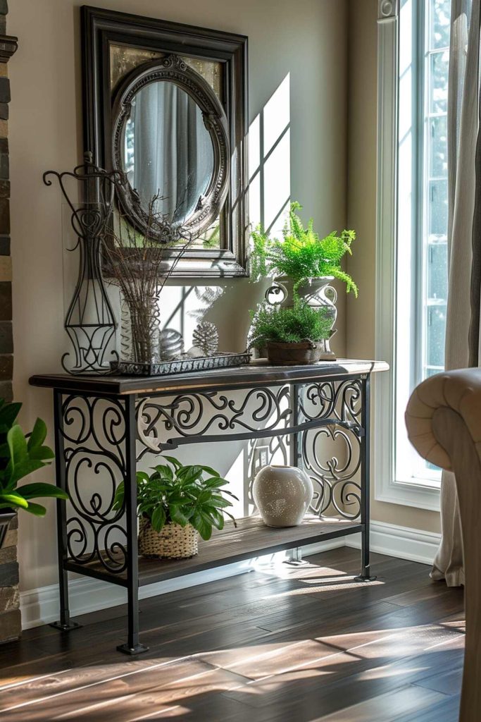 antique console table with antique vases and wrought iron decor, a mirror hanging above it