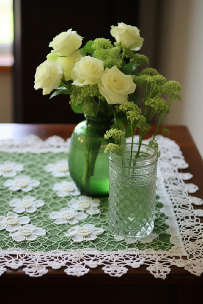 Take this wooden table for example. A lace table runner spreads above, paired with vases of white roses and small white flowers, creating a beautiful, intimate atmosphere.