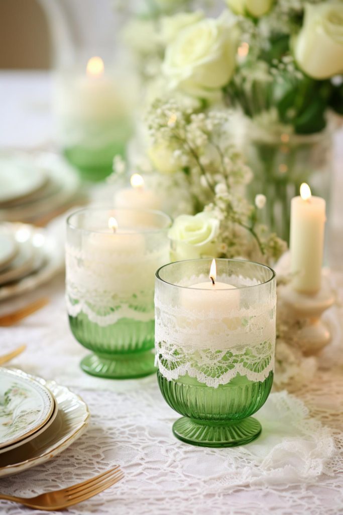 These small votive candles combine tradition, romance and luxury. They are wrapped in the delicate embrace of intricate Irish lace and placed on a table with a lace tablecloth, white roses and vintage tableware.