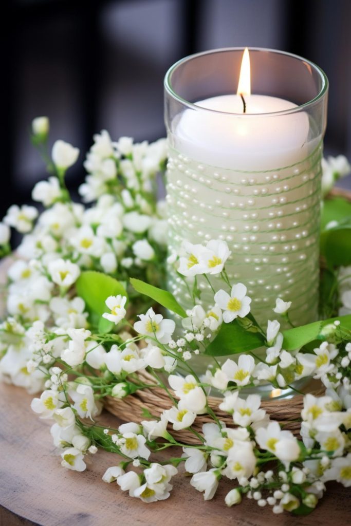 This enchanting and festive pearl-wrapped candle is surrounded by a delicate vine wreath lovingly decorated with artificial shamrock flowers, adding the warmth and beauty of nature to your celebration. 