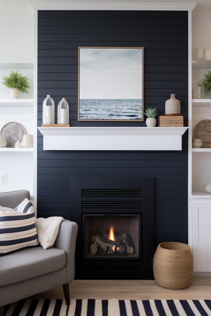 A black shiplap fireplace with a white mantel with a row of candles in glass jars on a <a href=