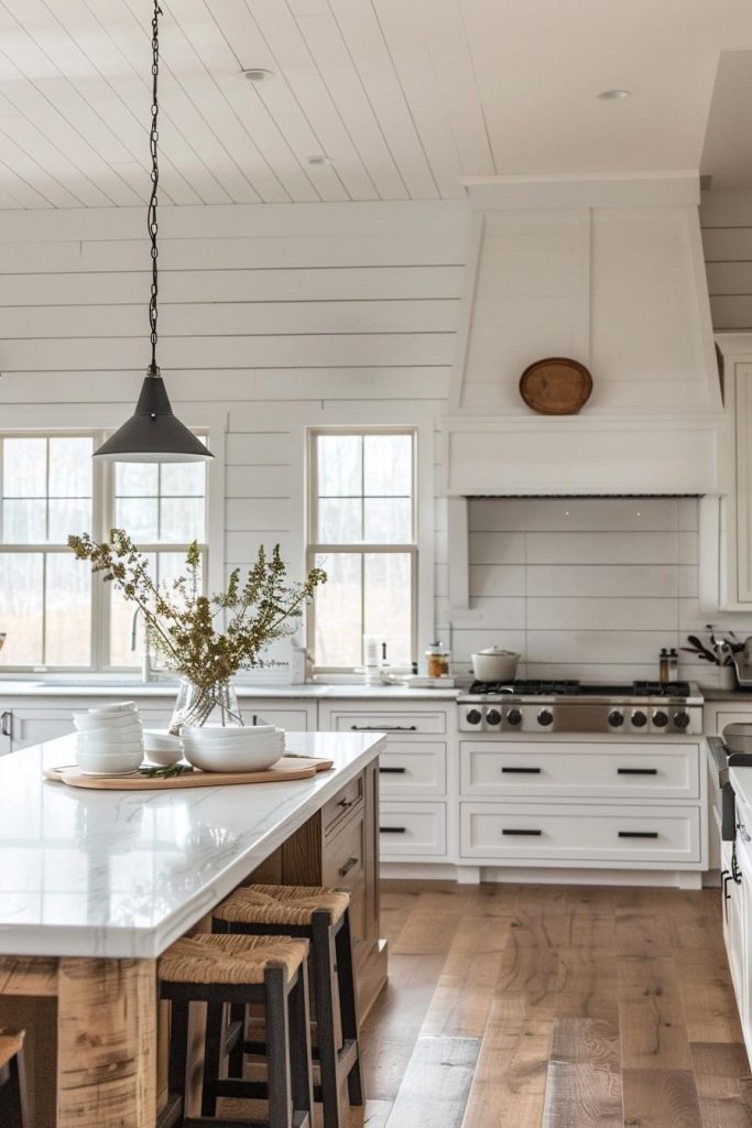 A classic, bright white painted back wall breathes life into the kitchen and reflects the straightforward charm of farmhouse life.