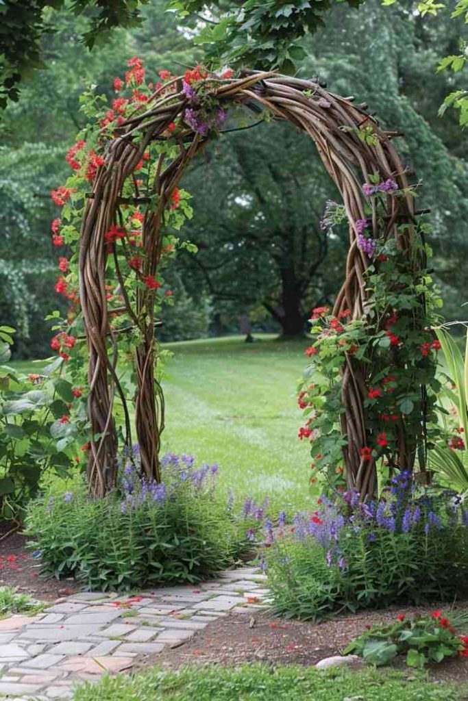 Crafted from the bounty of the forest, this branch trellis is a handwoven creation that invites sweet peas and climbing roses to intertwine in its sturdy yet whimsical structure, bringing a piece of the forest into your garden.