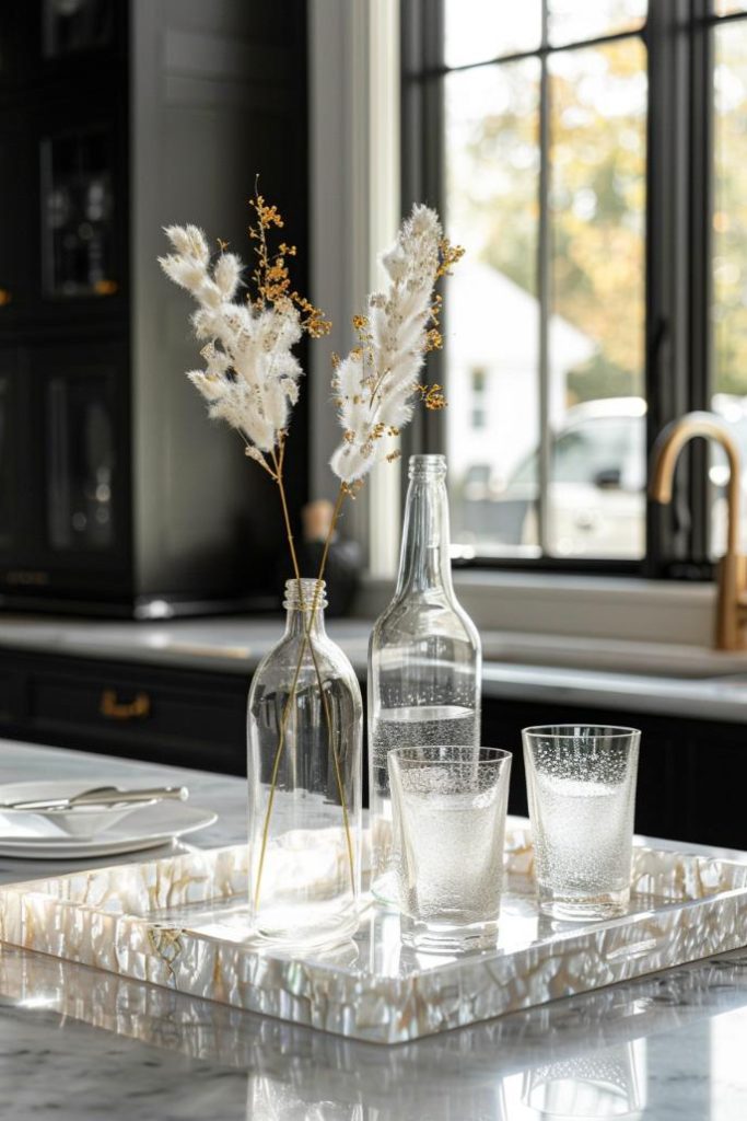 Subtly sparkling, this mother of pearl keeps a bottle of water and glasses in the kitchen simultaneously hydrating and impressing.