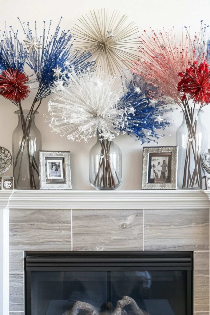 A decorative coat is decorated with large, sparkling fireworks in red, white and blue. Framed black and white photos are interspersed between the vases, and a golden Starburst ornate is located above the display.