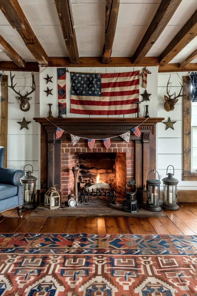 A rustic living room has a brick fireplace with a roaring fire. There is a large American flag above the fireplace, which is flanked by mounted deer antlers and star decorations. The stove is decorated with lanterns and a colorful carpet covers the wooden floor.