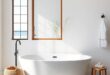 Embrace Serenity: Designing a Coastal Bathroom Featuring a Freestanding Tub