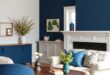 Transform Your Farmhouse Living Room with Deep Navy Blue Accents and Charm